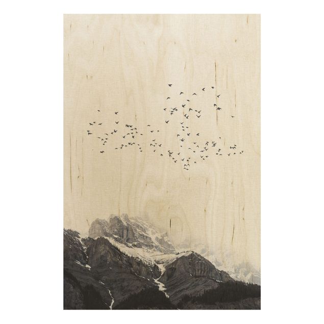 Prints på træ landskaber Flock Of Birds In Front Of Mountains Black And White