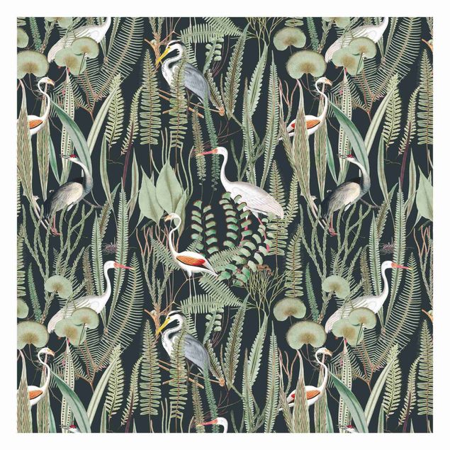 Moderne tapet Flamingos And Storks With Plants On Green