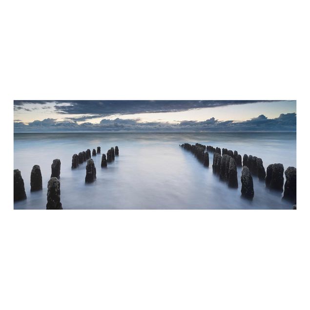 Glasbilleder strande Old Wooden Posts In The North Sea On Sylt