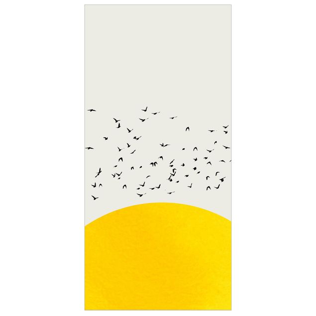 Rumdeler Flock Of Birds In Front Of Yellow Sun