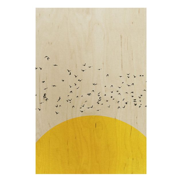 Prints på træ landskaber Flock Of Birds In Front Of Yellow Sun