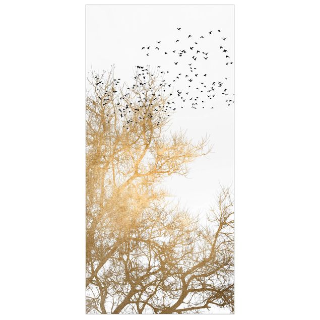 Rumdeler Flock Of Birds In Front Of Golden Tree