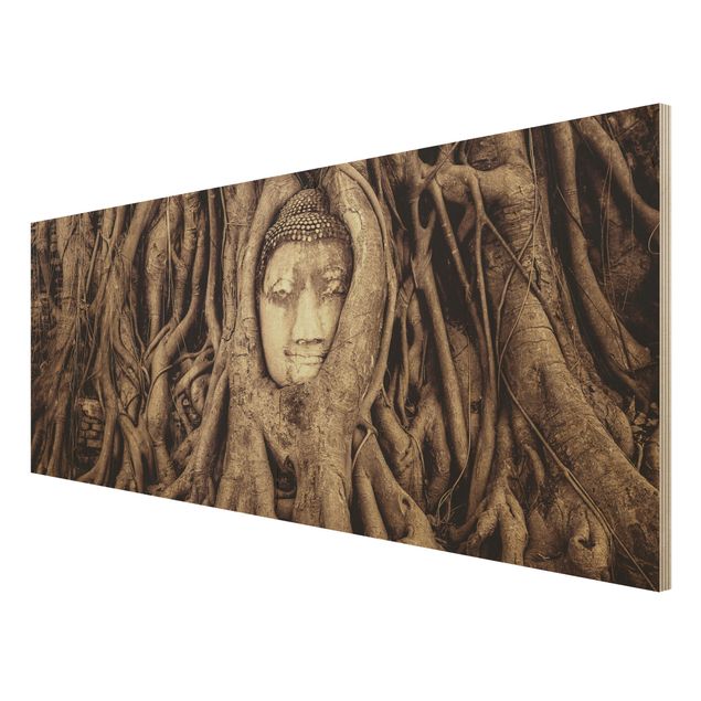 Prints på træ landskaber Buddha In Ayutthaya Lined From Tree Roots In Brown