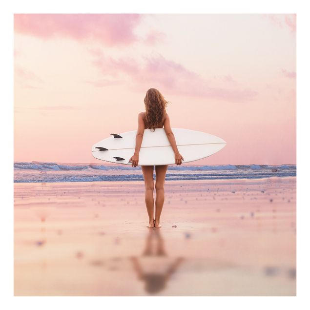 Glasbilleder strande Surfer Girl With Board At Sunset