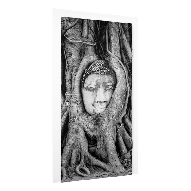 Fototapet solnedgange Buddha In Ayutthaya Lined From Tree Roots In Black And White