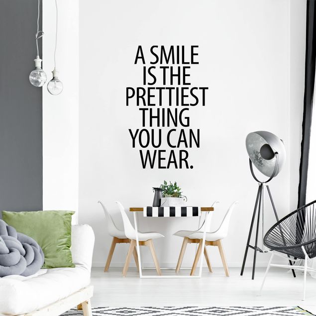 Wallstickers ordsprog A Smile Is The Prettiest Thing Sans Serif